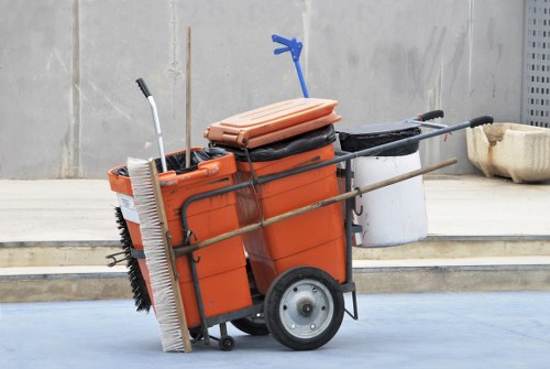Front view of commercial waste containers at a business site